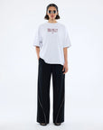 ENA PELLY | VARSITY ARCH TEE
